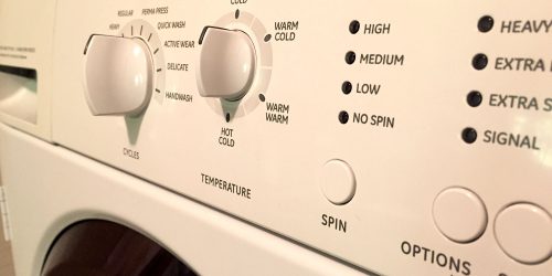 Close up of a clothes washing machine